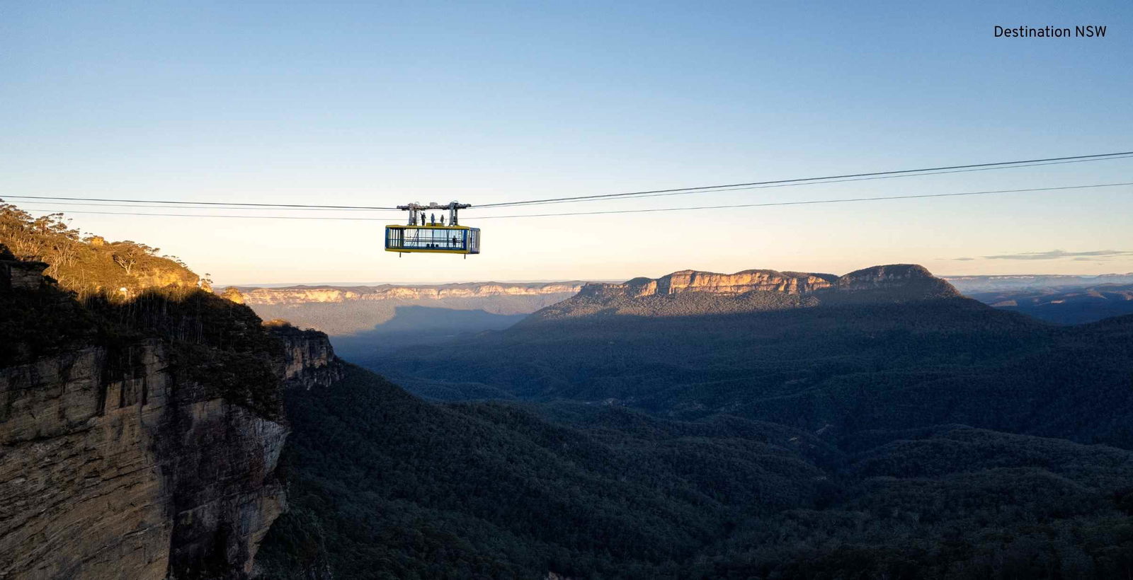 Scenic Sky Way Gondola going over blue mountains