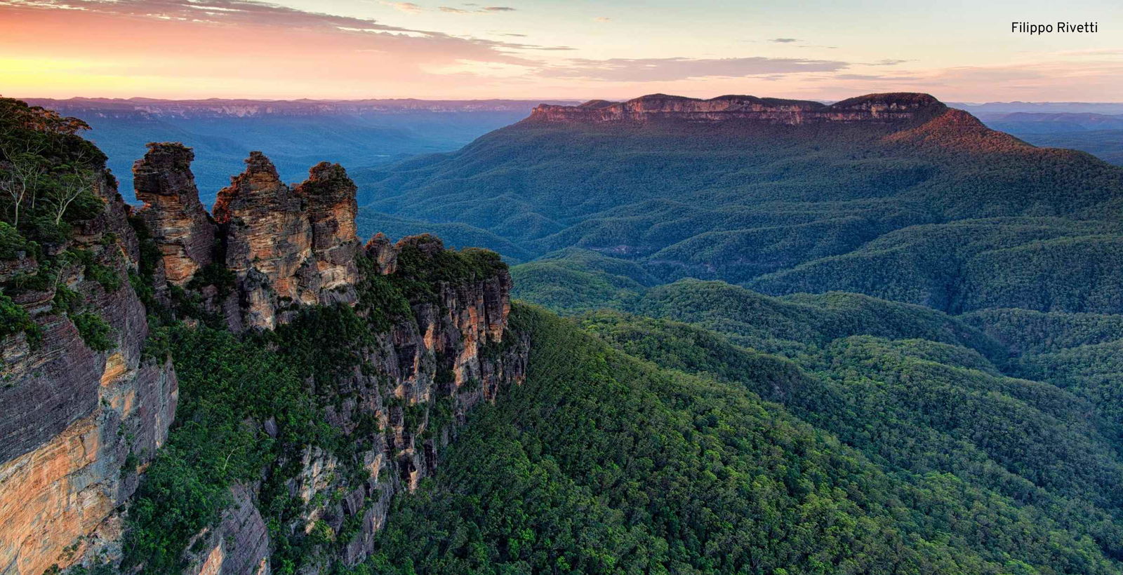 Pretty sunset setting in the background behind the Blue Mountains in New South Wales.